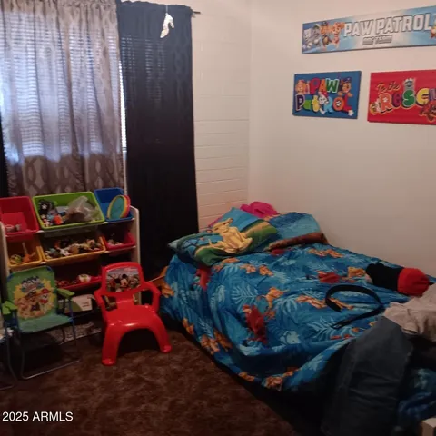 a view of a workspace with furniture