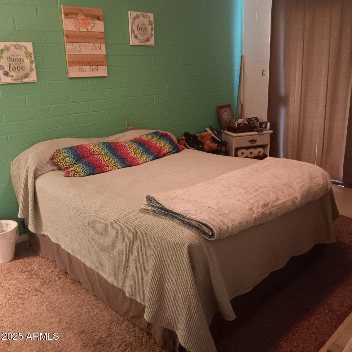 719 North Cherry Mesa, AZ 85201 - Photo 18 of 18 a bedroom with a bed and green walls