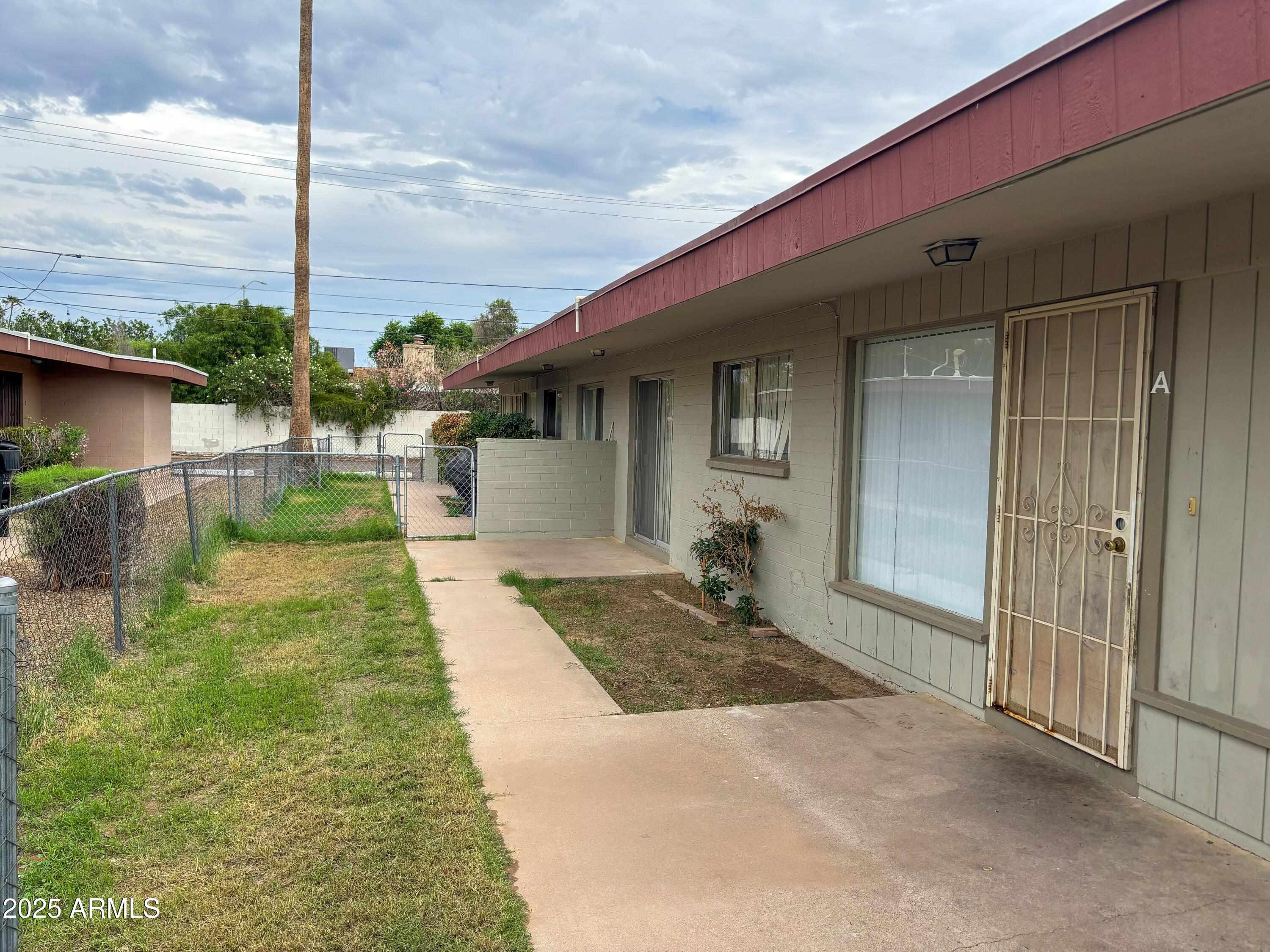 719 North Cherry Mesa, AZ 85201 - Photo 2 of 18 a house view with a backyard space