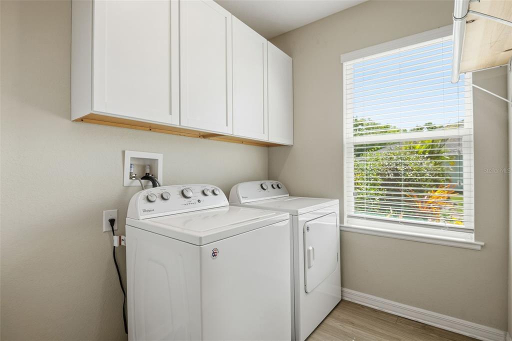 4322 Kiska Road North Port, FL 34288 - Photo 24 of 37 a utility room with dryer and washer