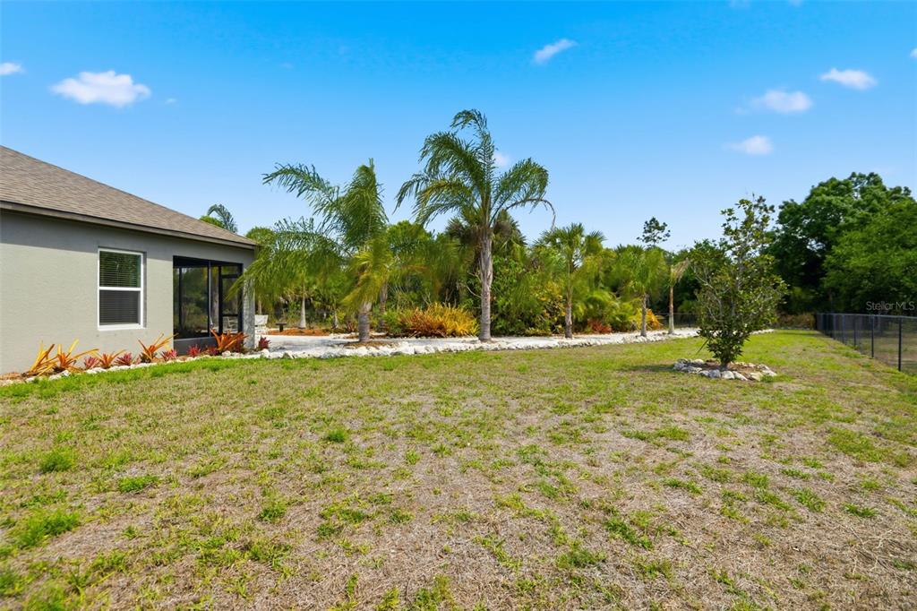 4322 Kiska Road North Port, FL 34288 - Photo 31 of 37 a view of backyard with swimming pool and outdoor seating