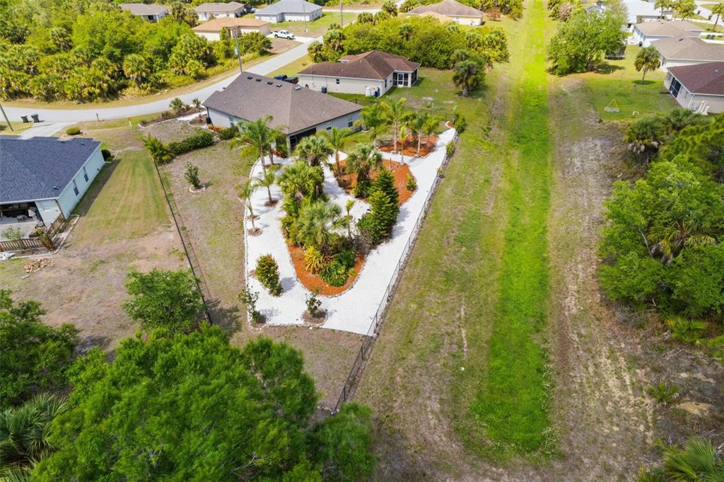 4322 Kiska Road North Port, FL 34288 - Photo 34 of 37 an aerial view of residential house with swimming pool