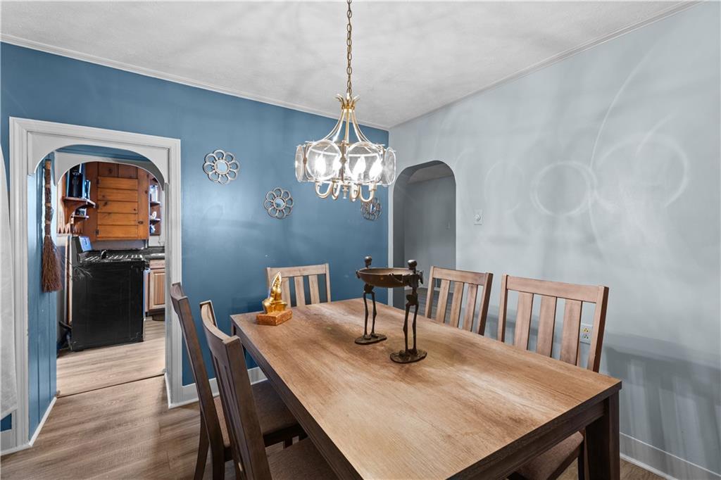 710 5th Street Charleroi, PA 15022 - Photo 12 of 30 a view of a dining room with furniture and wooden floor