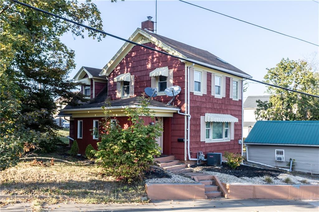 710 5th Street Charleroi, PA 15022 - Photo 2 of 30 a front view of a house with yard