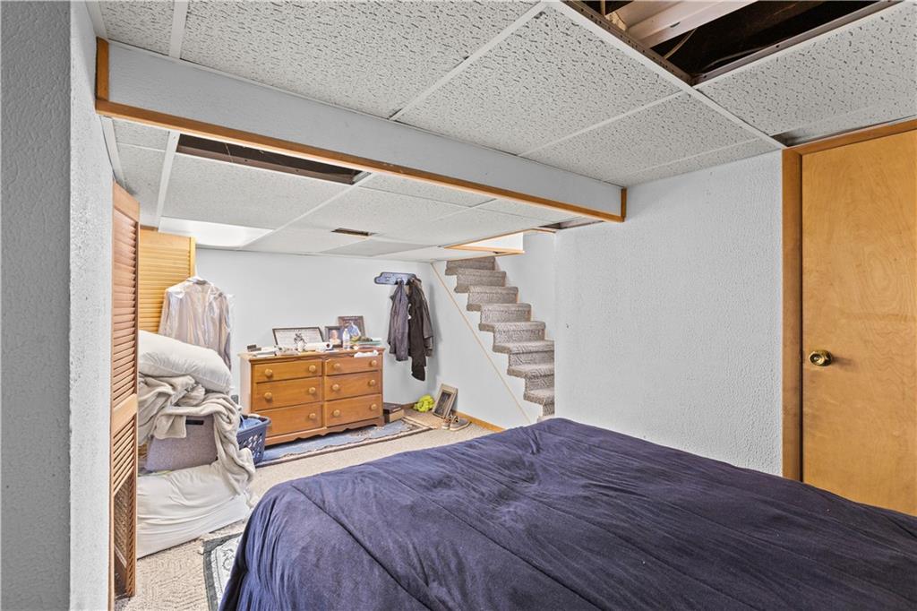 710 5th Street Charleroi, PA 15022 - Photo 26 of 30 a bedroom with a bed and a window