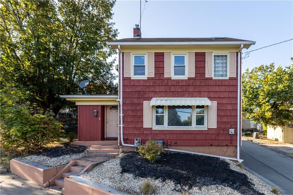 710 5th Street Charleroi, PA 15022 - Photo 3 of 30 a front view of a house with garden