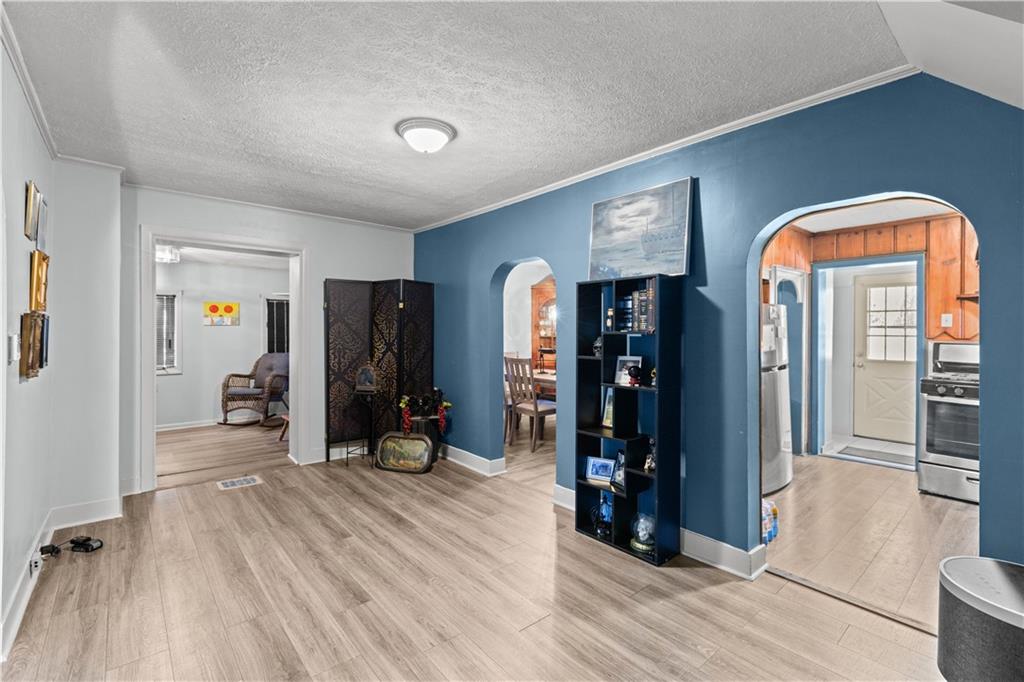 710 5th Street Charleroi, PA 15022 - Photo 7 of 30 a view of a room with wooden floor and furniture