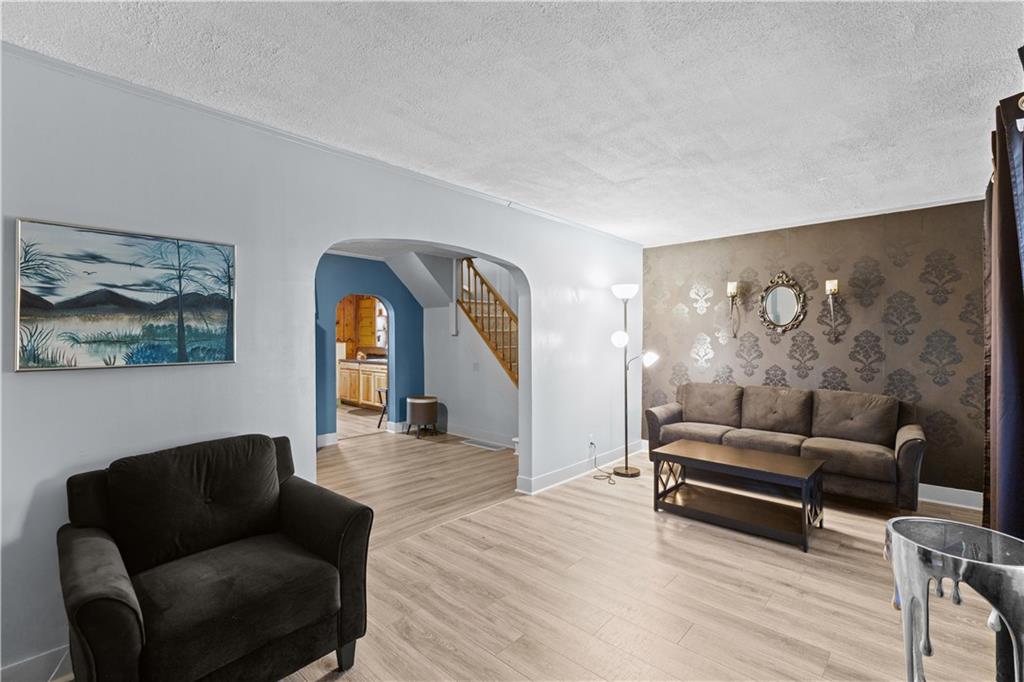 710 5th Street Charleroi, PA 15022 - Photo 9 of 30 a living room with furniture and a large window