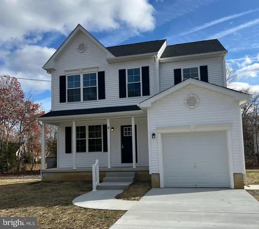 a front view of a house with yard