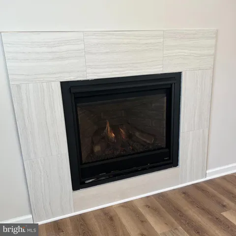 a living room with a fireplace