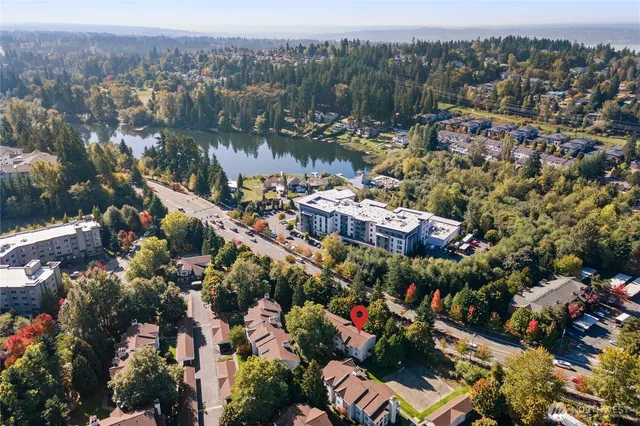 an aerial view of lake and residential houses