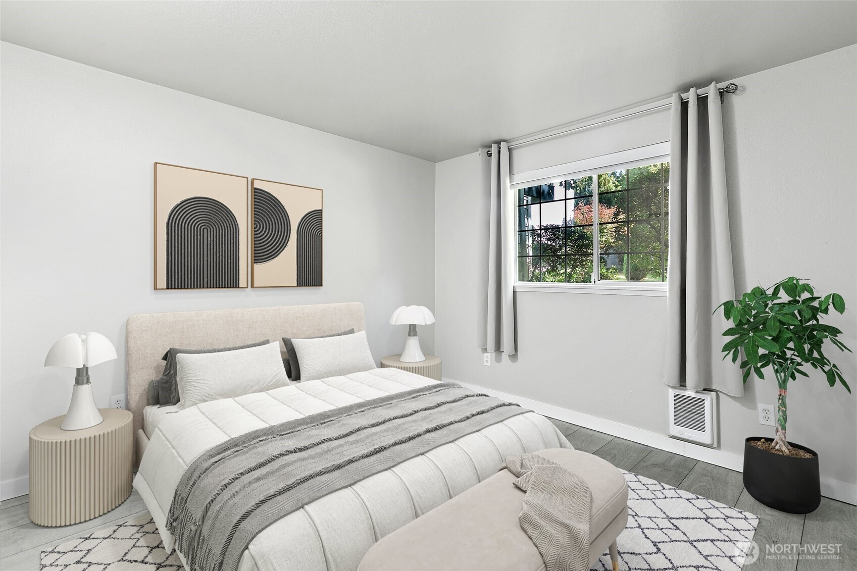 7453 Newcastle Golf Club Road, Unit M103 Newcastle, WA 98059 - Photo 7 of 18 a bedroom with a bed and a potted plant