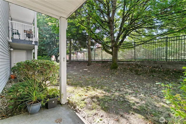 a backyard of a house with lots of green space