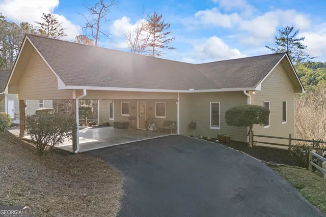 a view of a livingroom with furniture and window