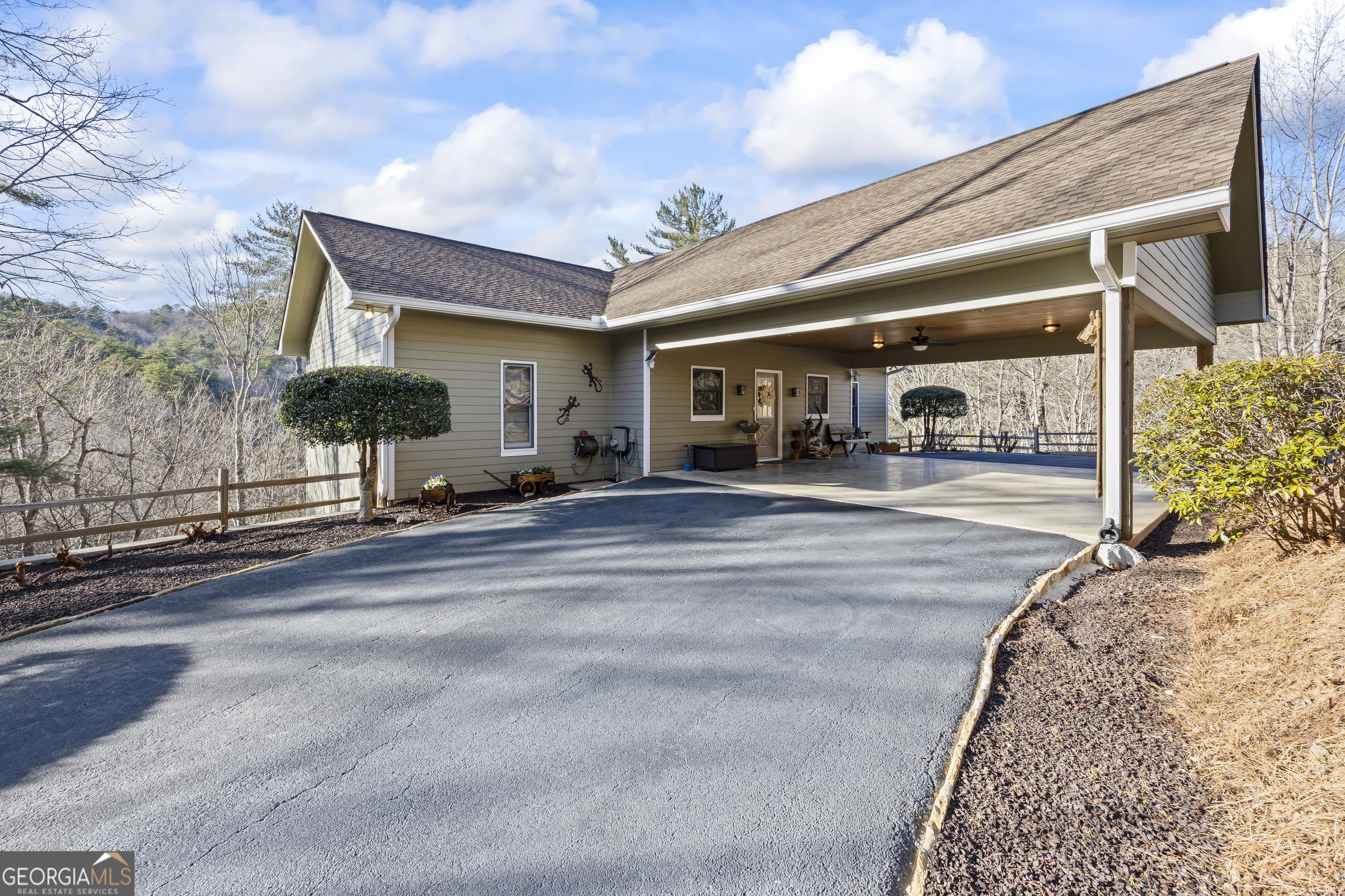 299 Celestial Circle Clayton, GA 30525 - Photo 12 of 89 a living room with furniture and a potted plant