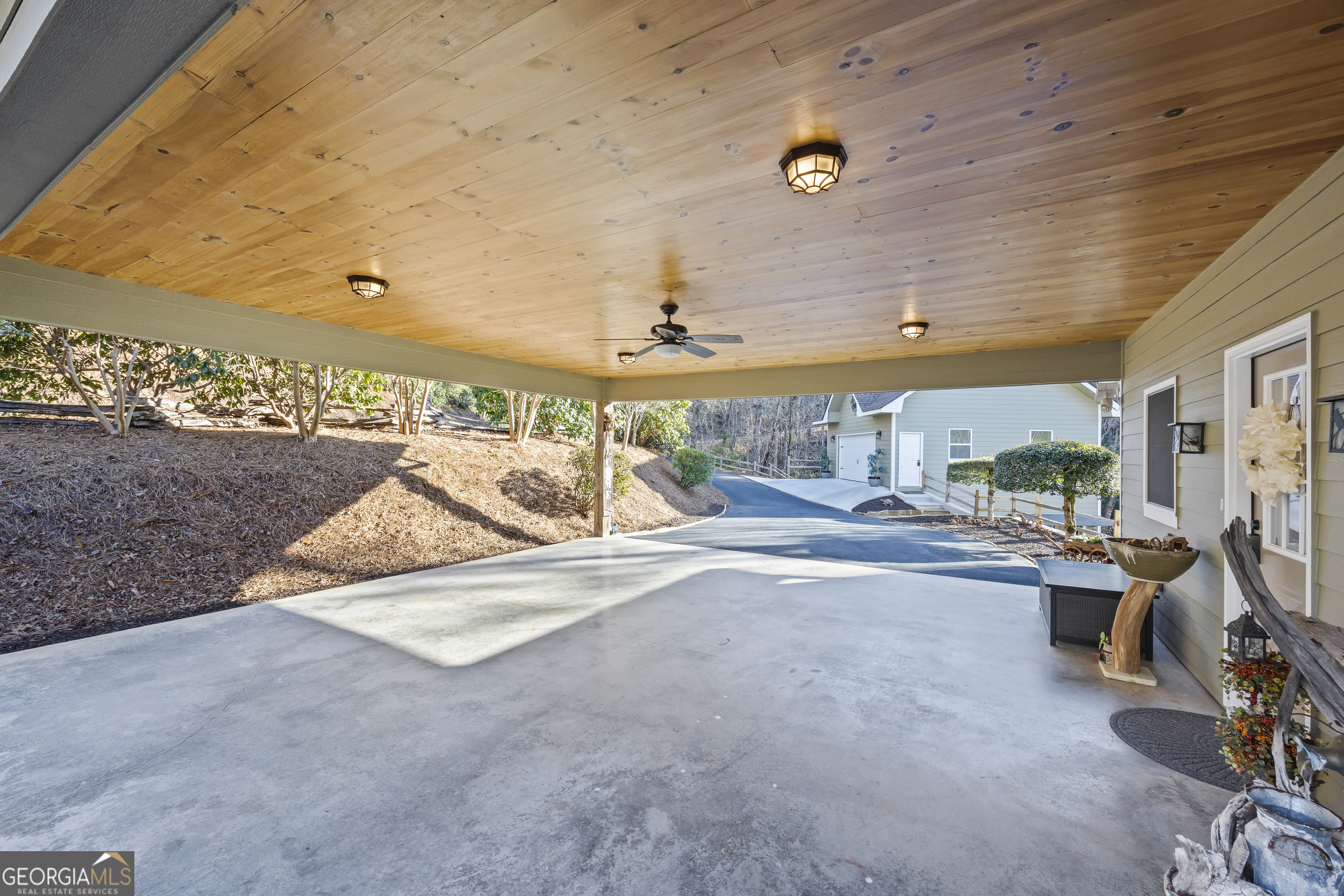 299 Celestial Circle Clayton, GA 30525 - Photo 13 of 89 a view of a patio with a table and chairs