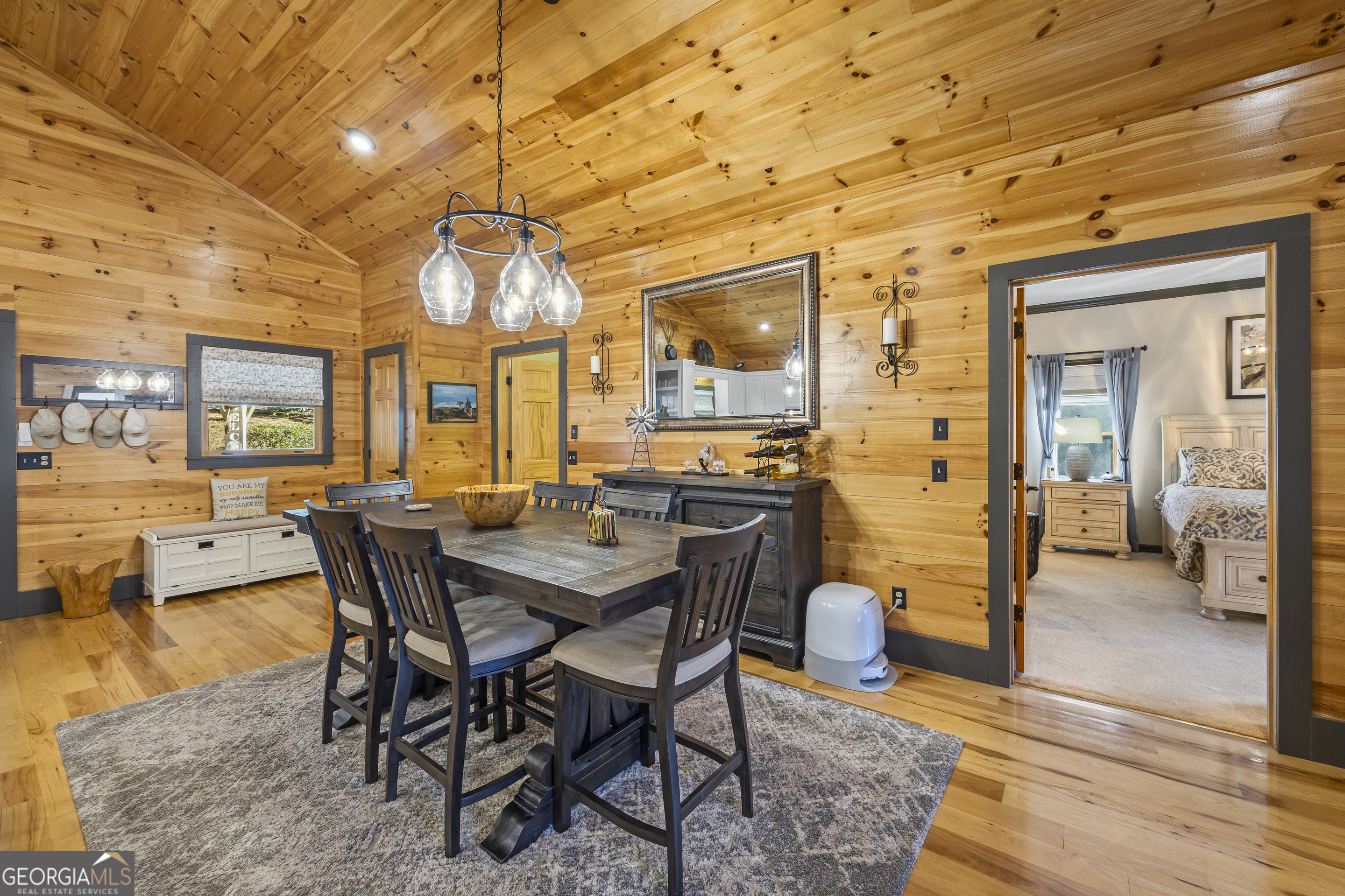 299 Celestial Circle Clayton, GA 30525 - Photo 23 of 89 a view of a dining room with furniture and wooden floor