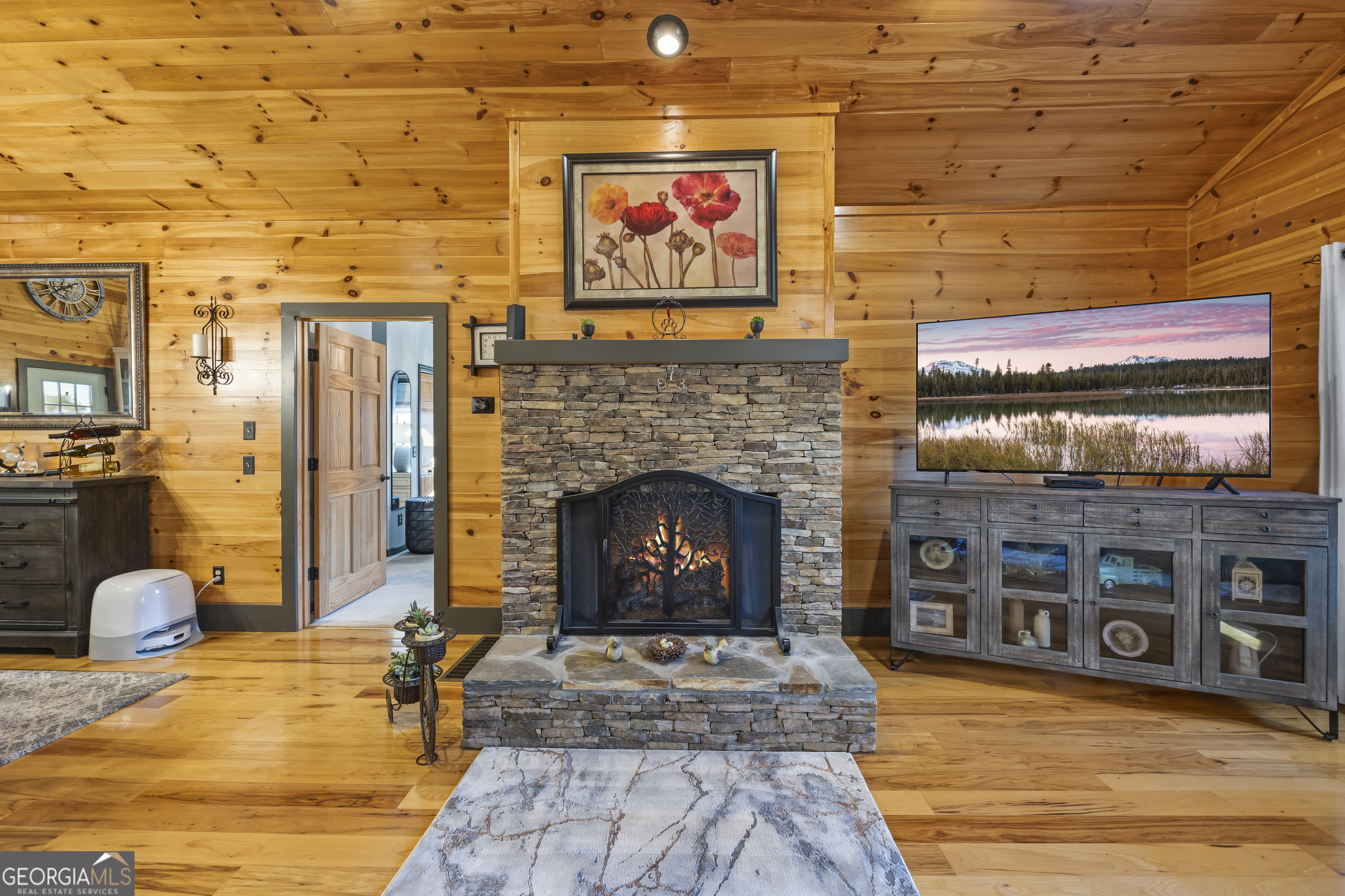 299 Celestial Circle Clayton, GA 30525 - Photo 26 of 89 a living room with furniture and a fireplace