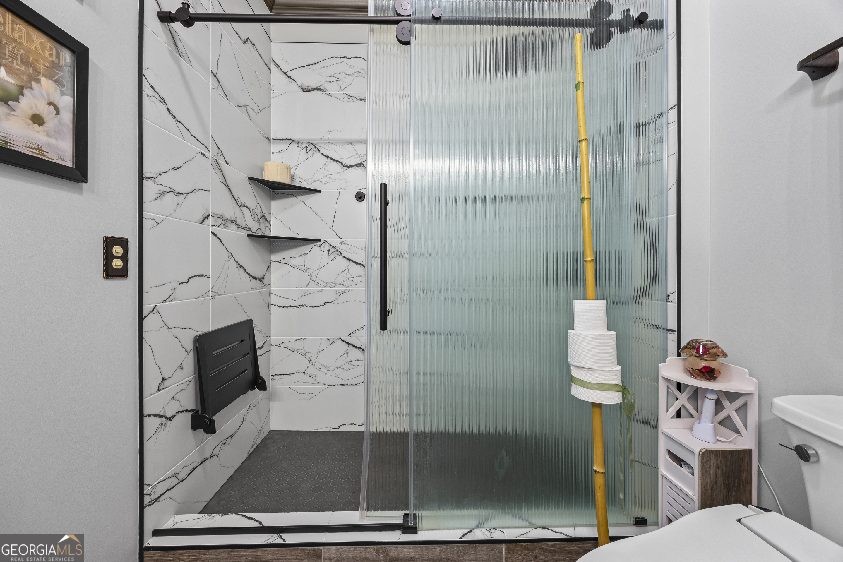 299 Celestial Circle Clayton, GA 30525 - Photo 36 of 89 a bathroom with a toilet and a shower