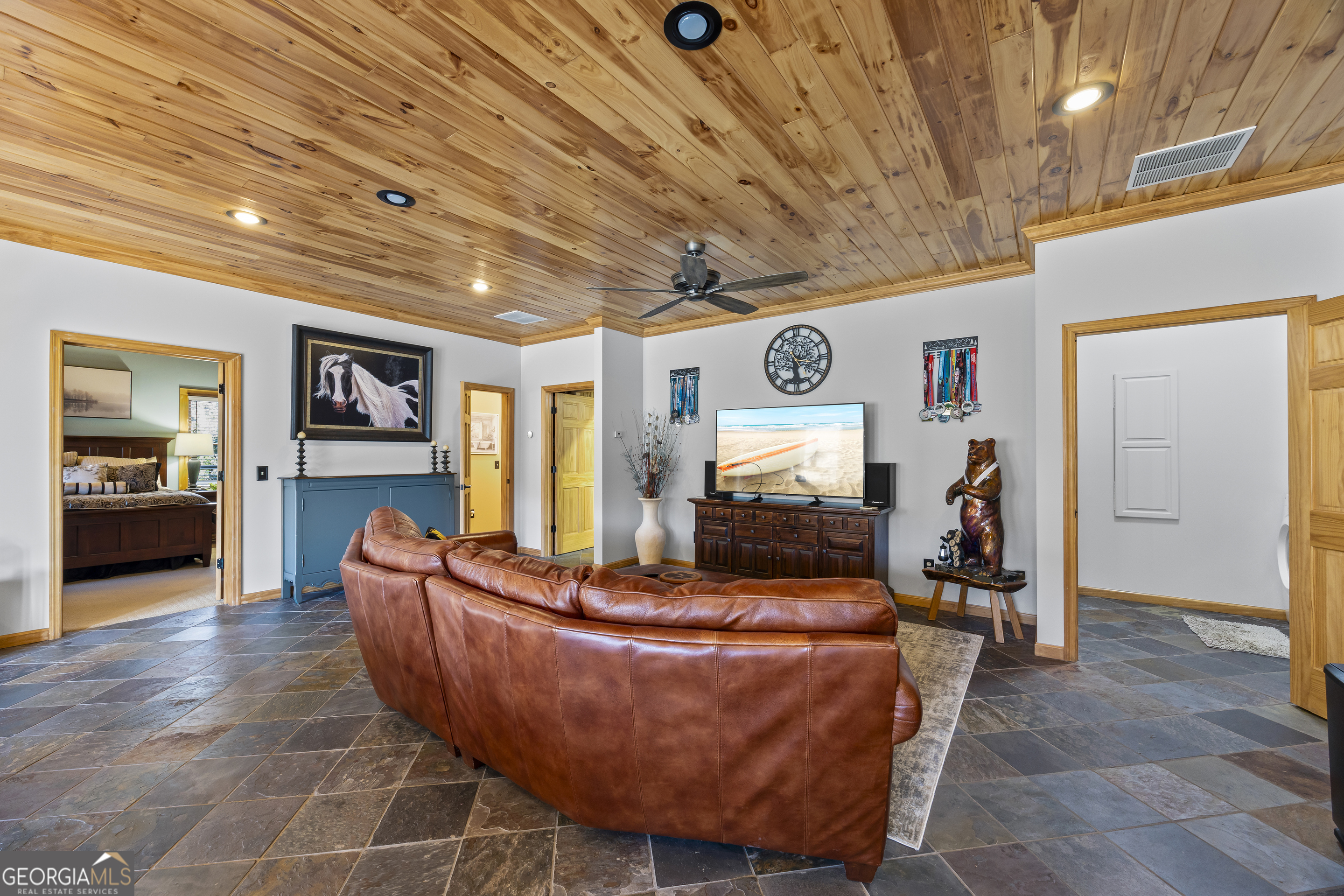 299 Celestial Circle Clayton, GA 30525 - Photo 45 of 89 a living room with furniture and a large window