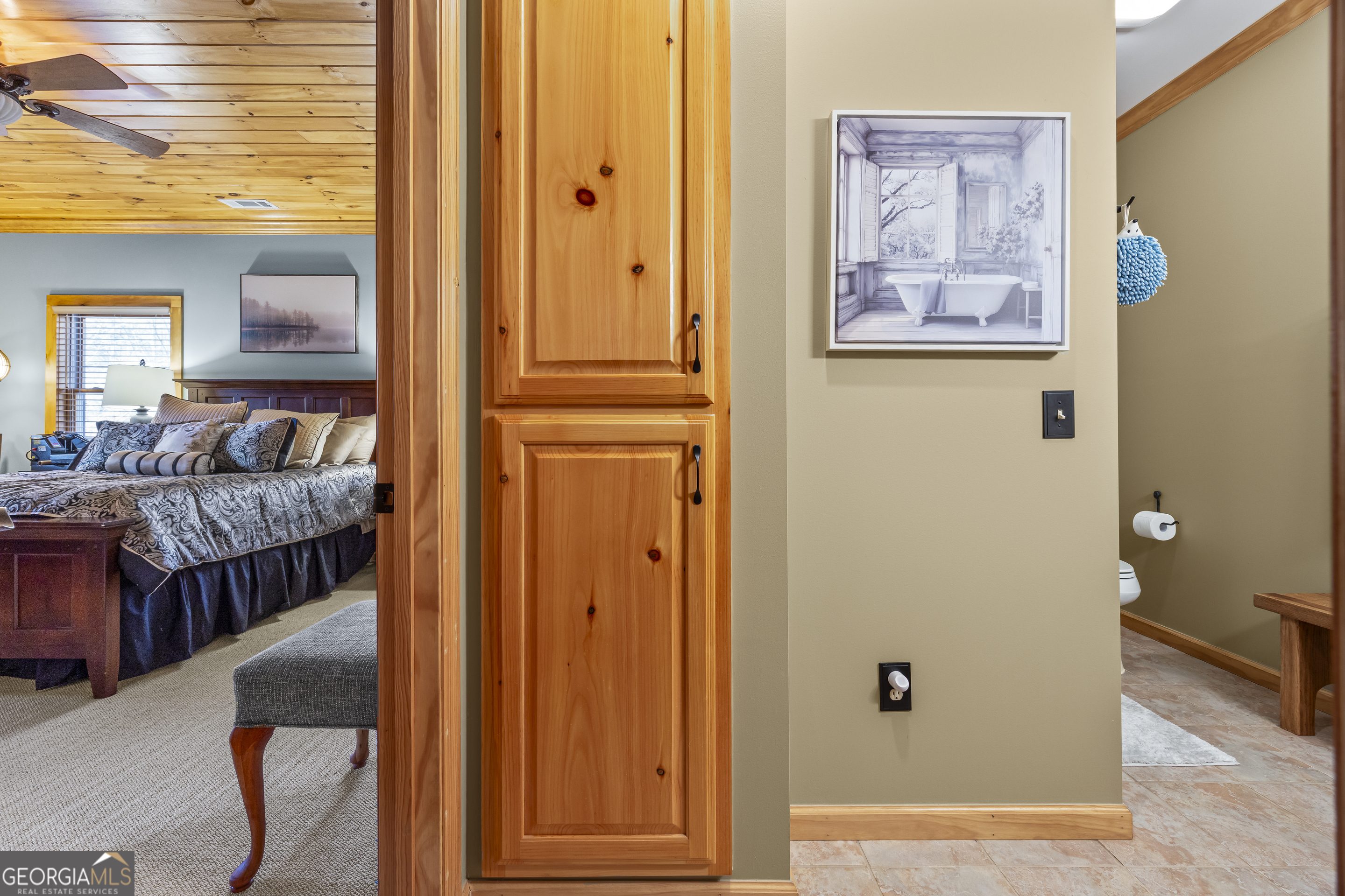 299 Celestial Circle Clayton, GA 30525 - Photo 51 of 89 a bedroom with a bed and a painting on the wall