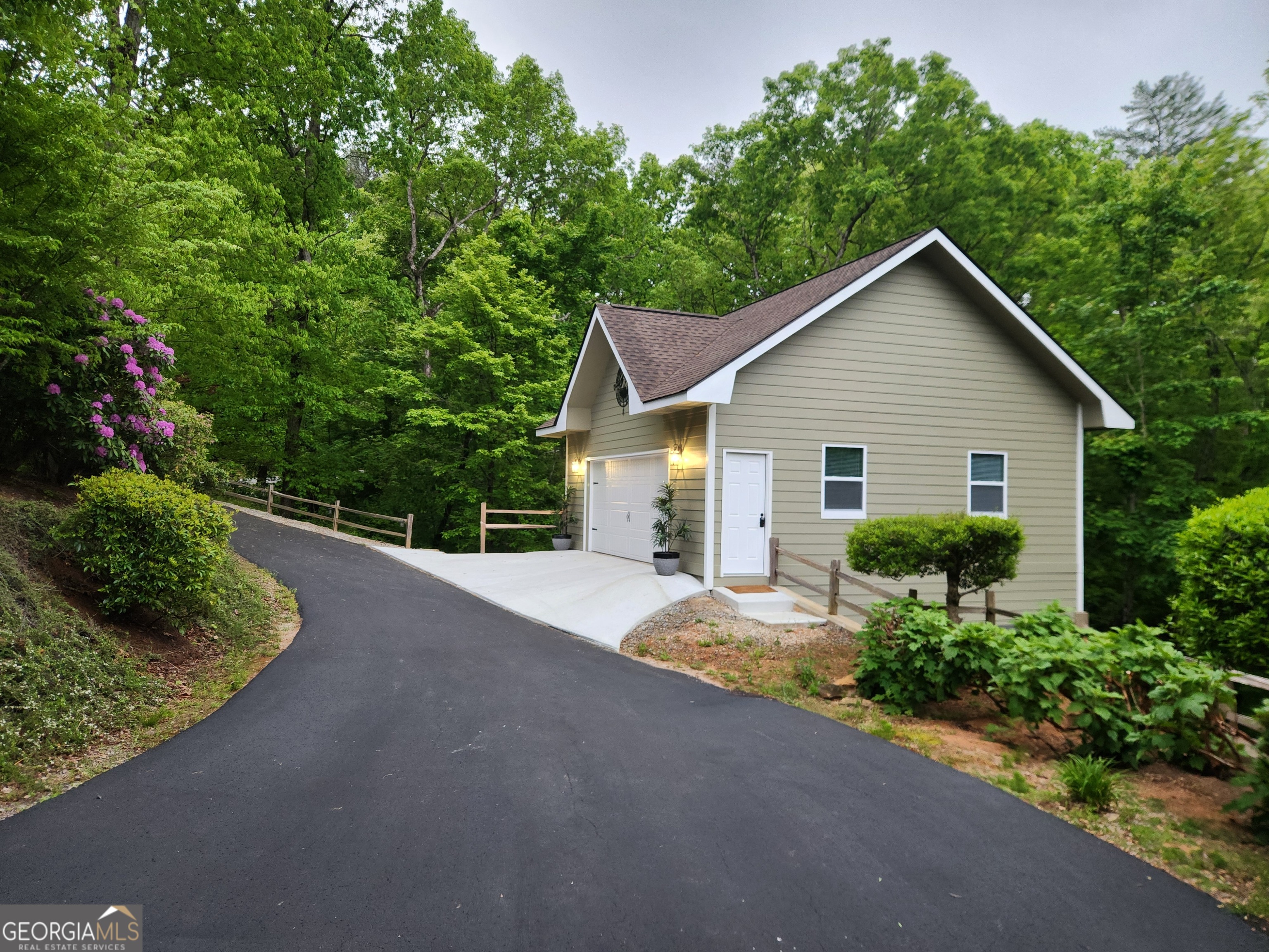 299 Celestial Circle Clayton, GA 30525 - Photo 6 of 89 a view of a house with a yard and potted plants