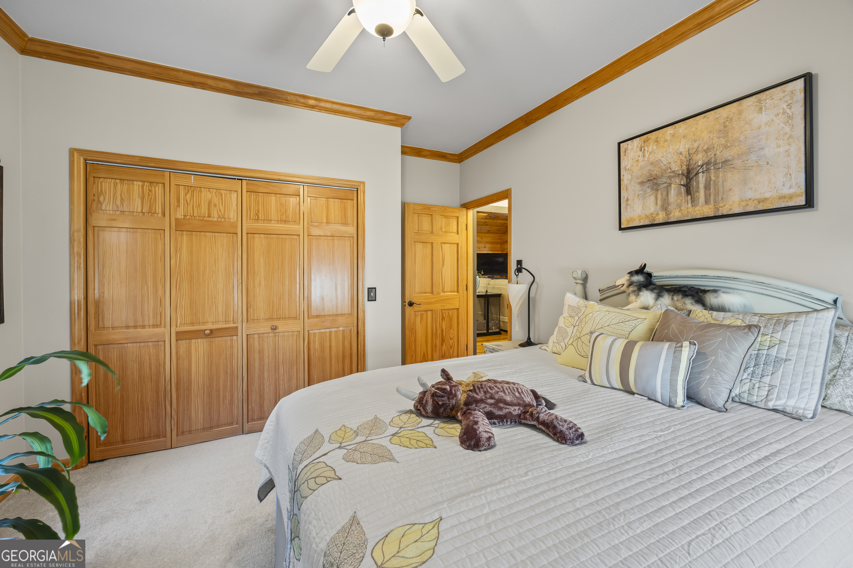 299 Celestial Circle Clayton, GA 30525 - Photo 64 of 89 a bedroom with a bed and a table