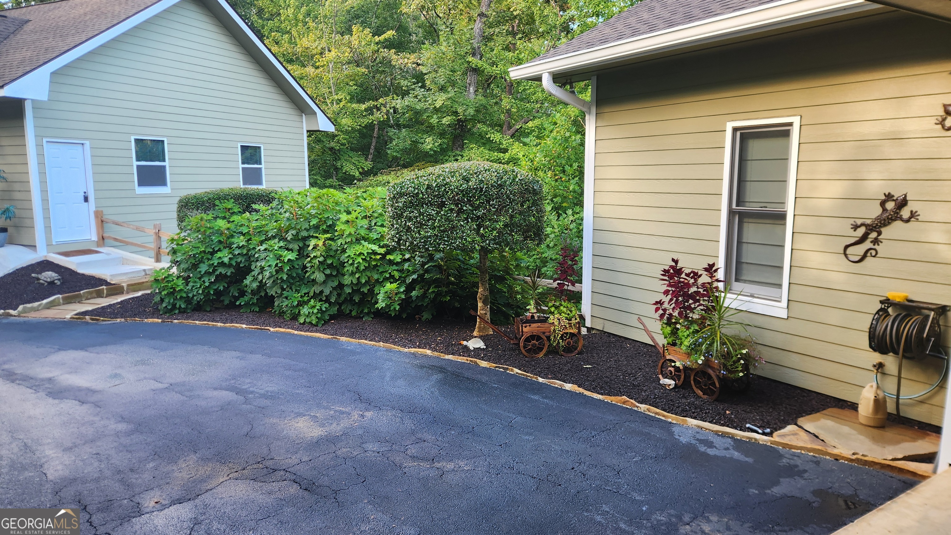 299 Celestial Circle Clayton, GA 30525 - Photo 7 of 89 a view of a house with backyard and garden