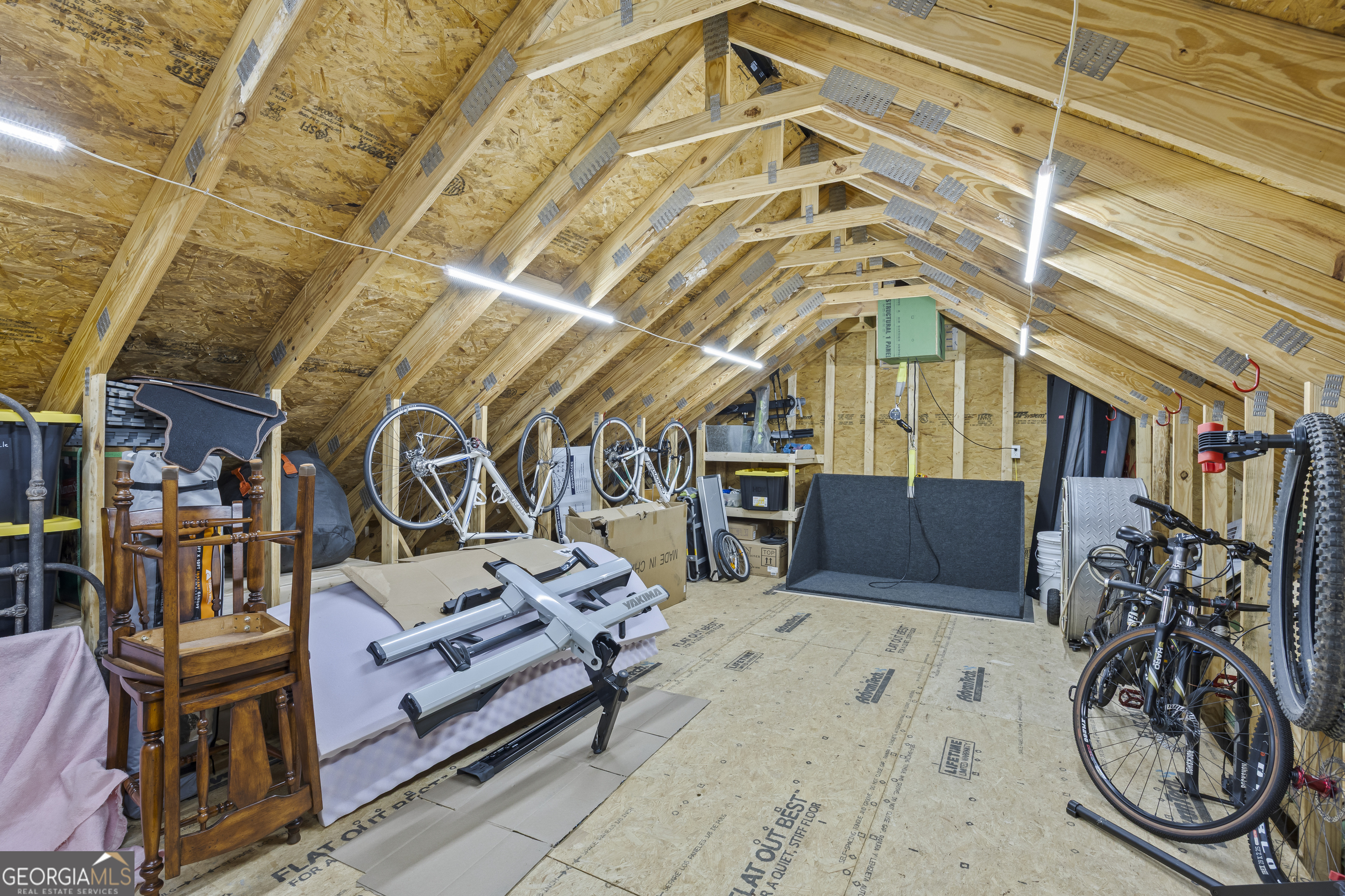 299 Celestial Circle Clayton, GA 30525 - Photo 79 of 89 a view of a room with racks on the wall