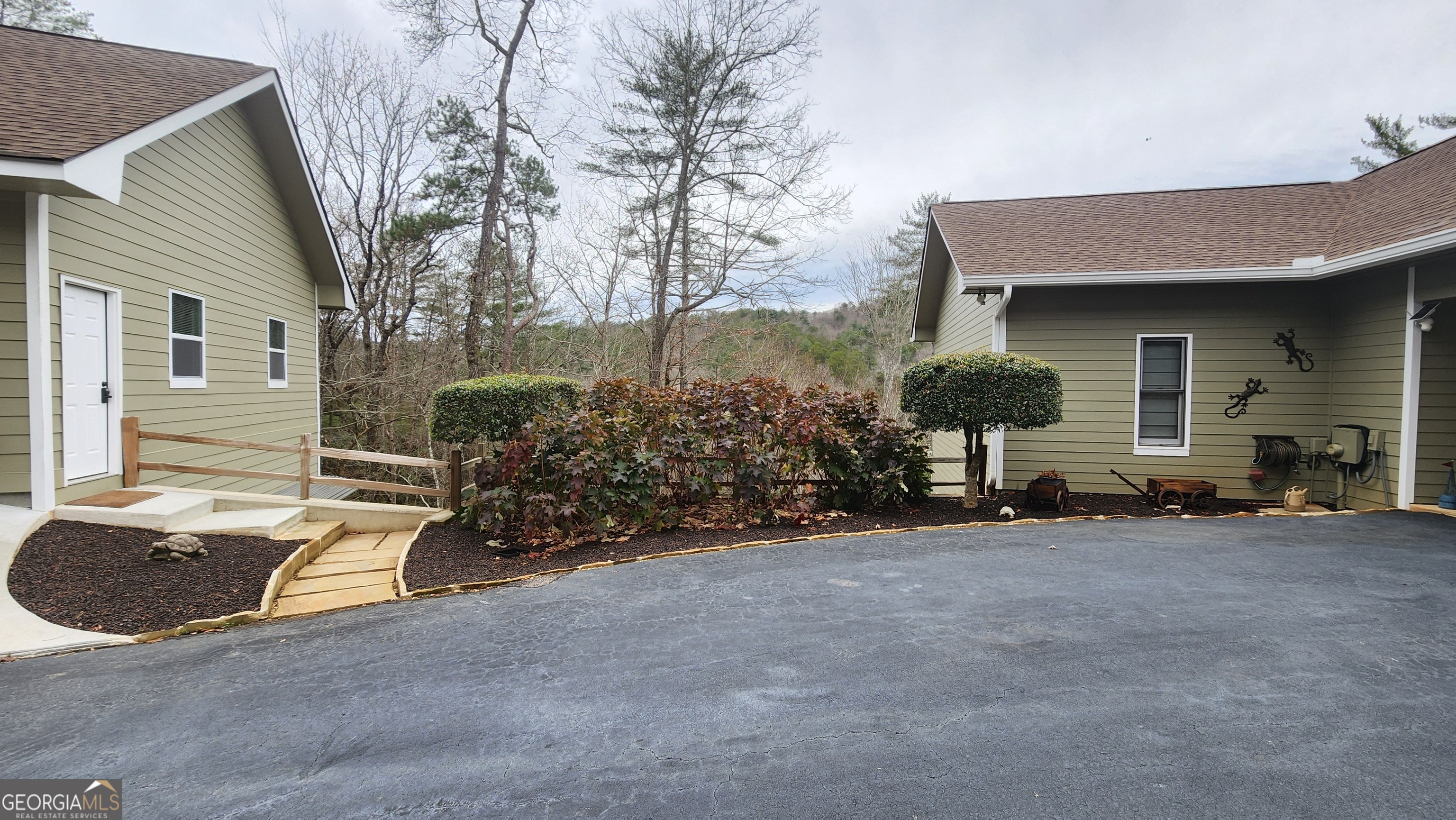 299 Celestial Circle Clayton, GA 30525 - Photo 10 of 89 a view of a house with backyard and sitting area