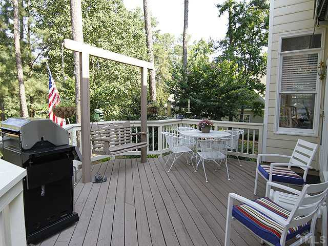 2964 Tillinghast Trail Raleigh, NC 27613 - Photo 5 of 23 Great place to grill and chill out. Well landscaped yard and golf course view. Exterior Back