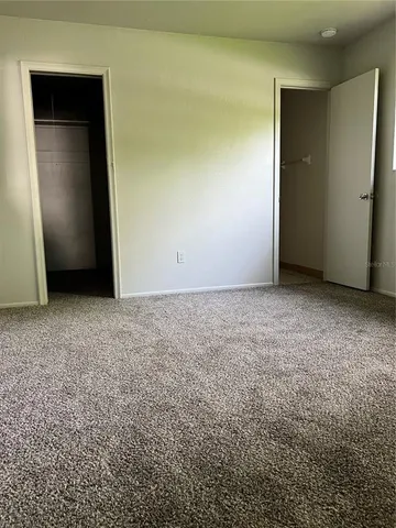 an empty room with closet