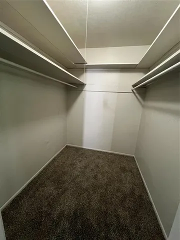 a view of a room with racks on the wall