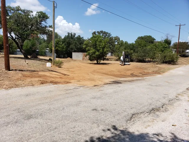 a view of road with trees