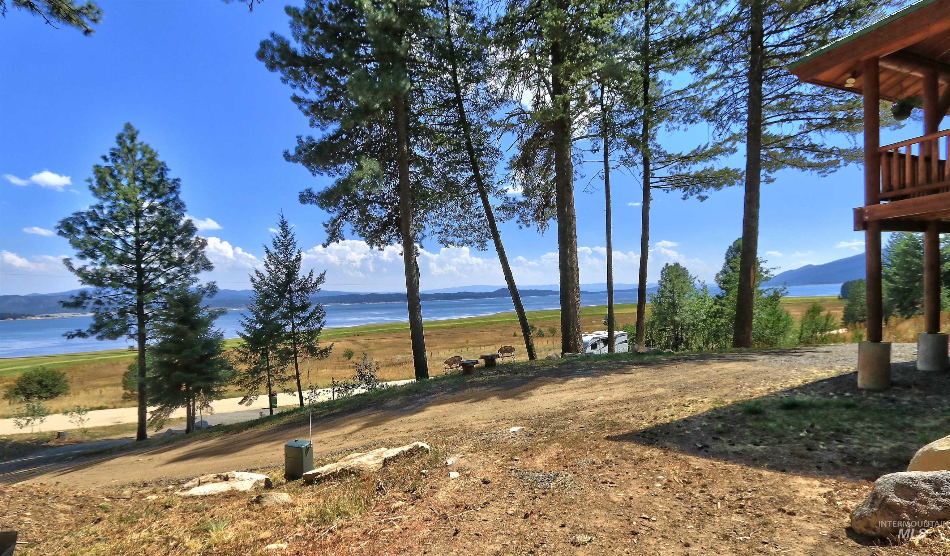 1539 West Mountain Road Cascade, ID 83611 - Photo 22 of 33 View of yard with a water and mountain view