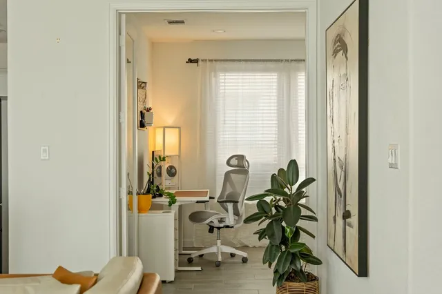 a view of a livingroom with furniture and a couch