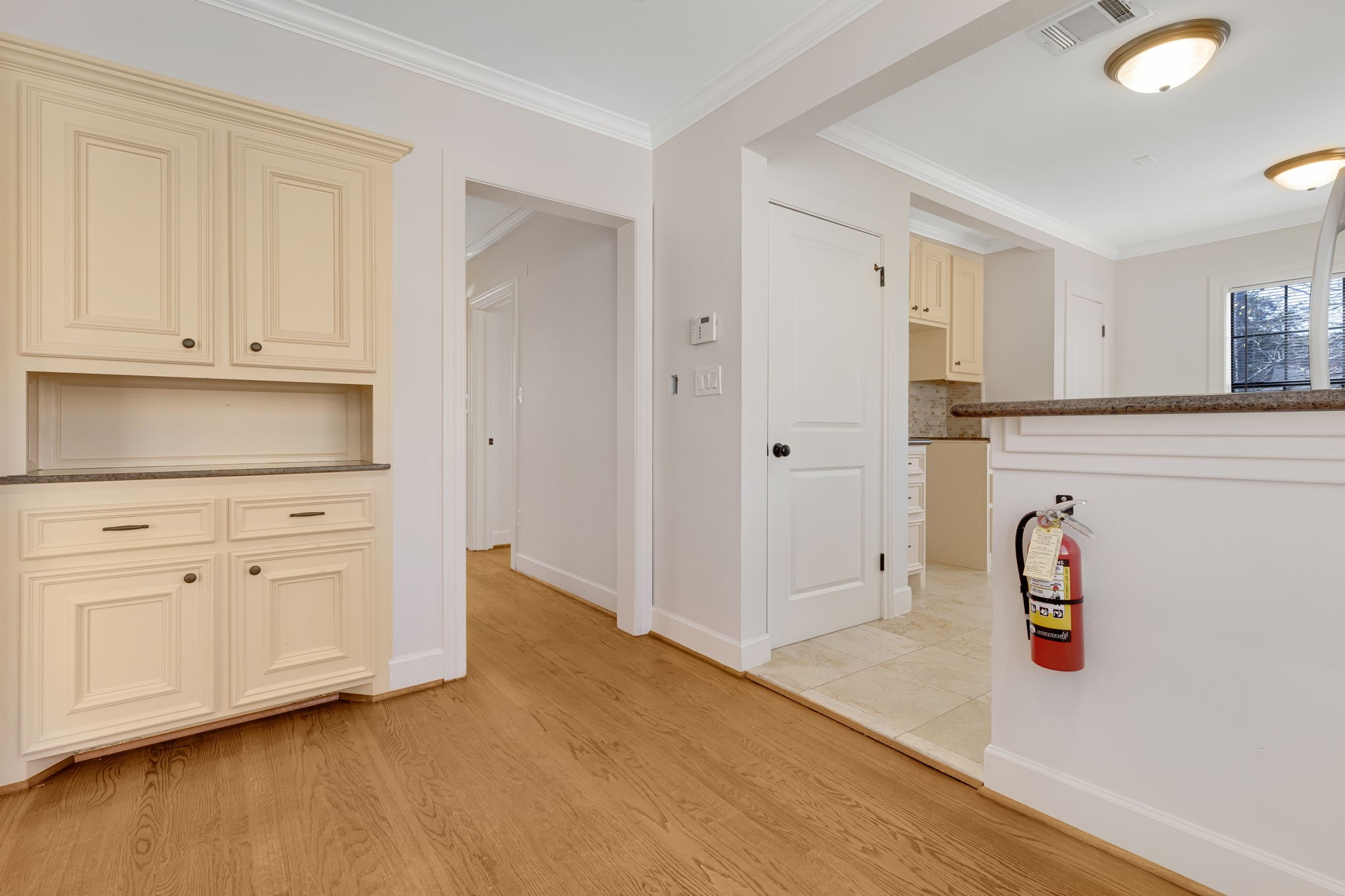 2306 Blodgett Street, Unit 2 Houston, TX 77004 - Photo 5 of 12 a view of kitchen with white cabinets