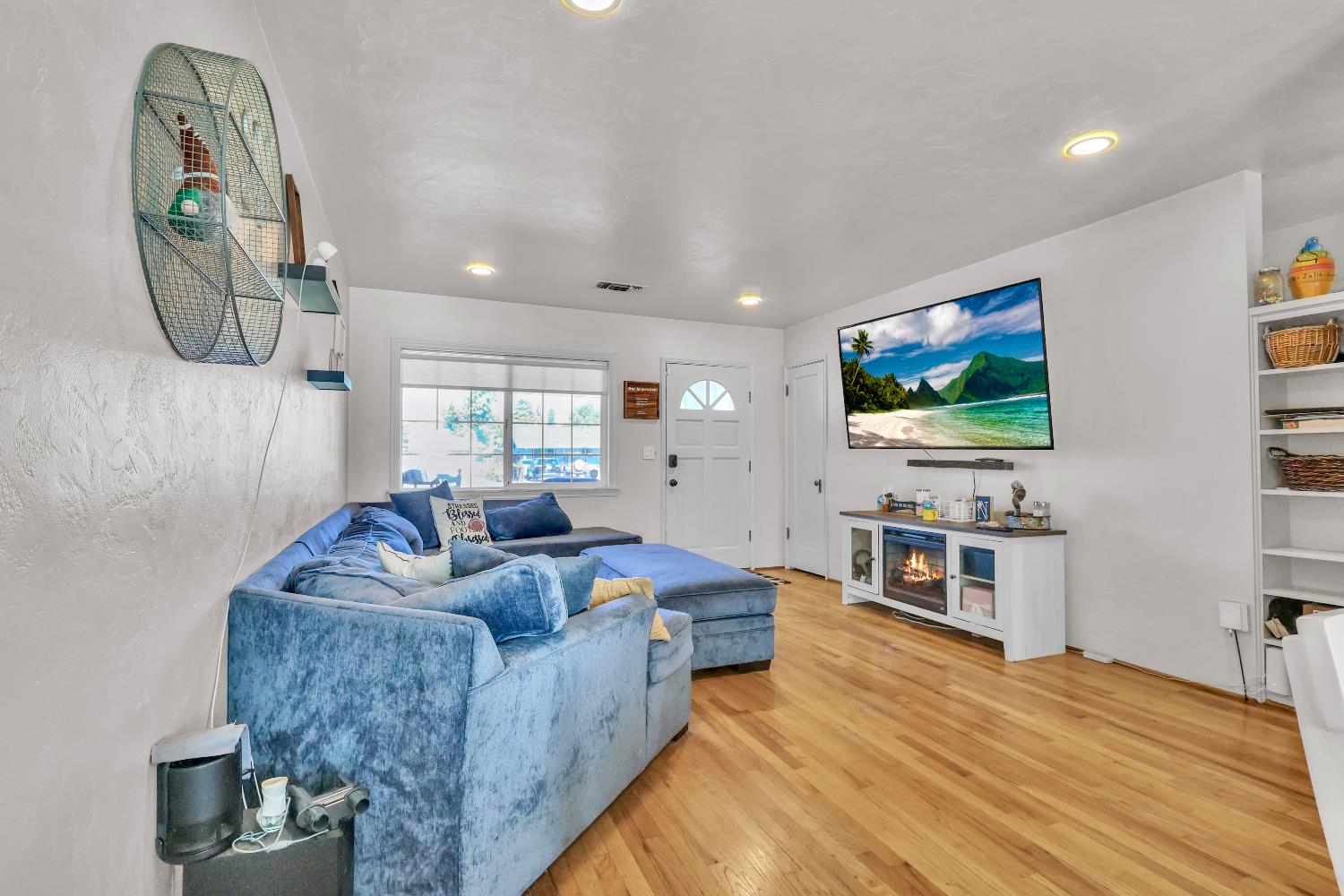 606 West Turner Road Lodi, CA 95240 - Photo 11 of 41 a living room with furniture and a flat screen tv
