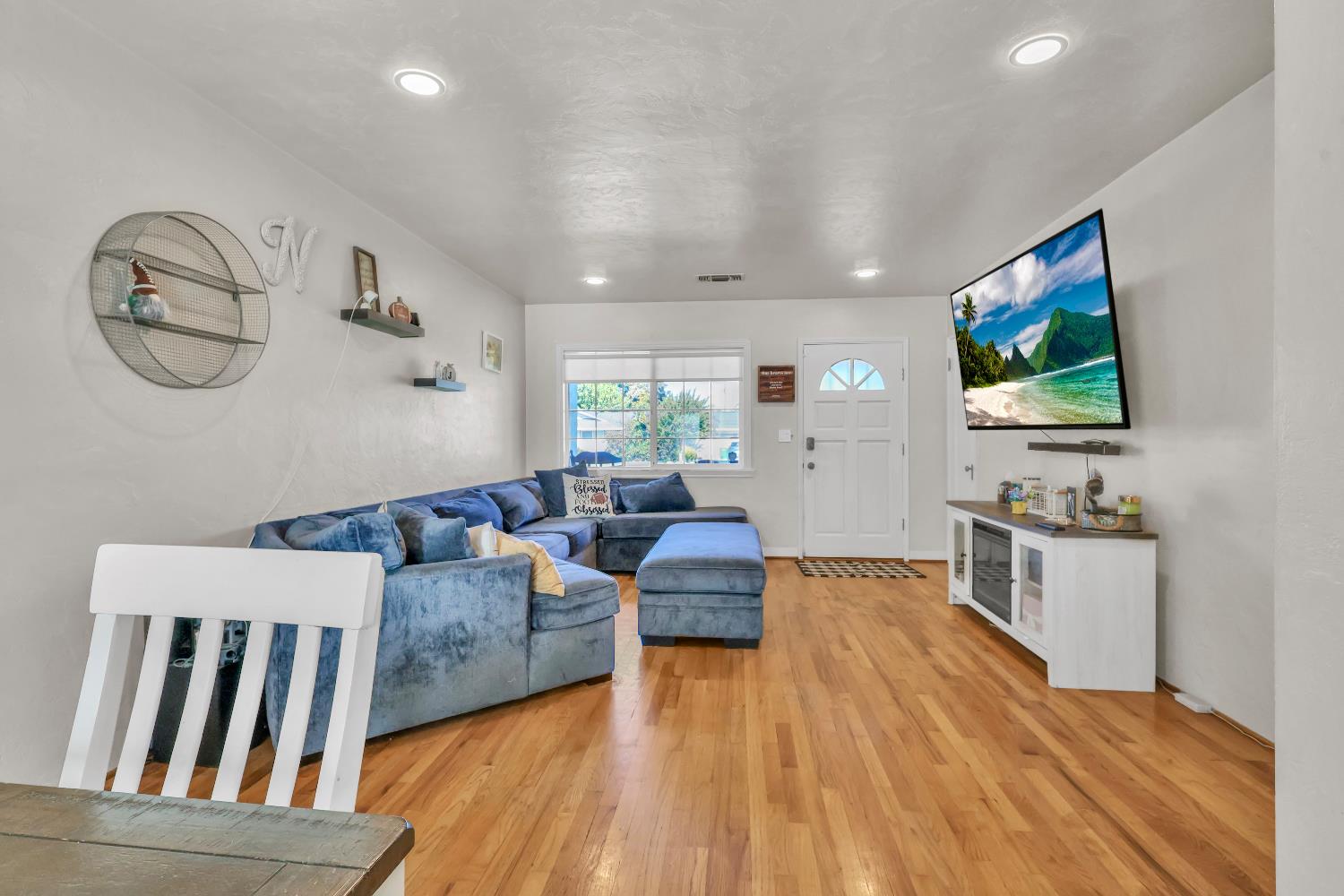 606 West Turner Road Lodi, CA 95240 - Photo 12 of 41 a living room with furniture and a flat screen tv