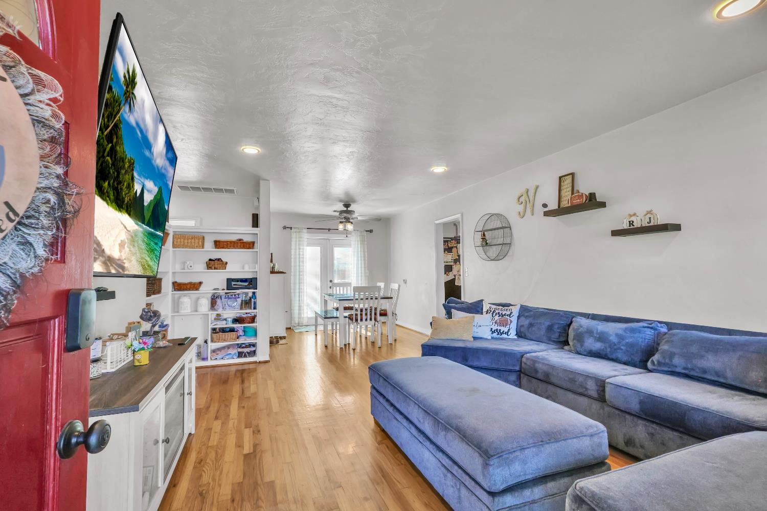 606 West Turner Road Lodi, CA 95240 - Photo 19 of 41 a living room with furniture and a flat screen tv