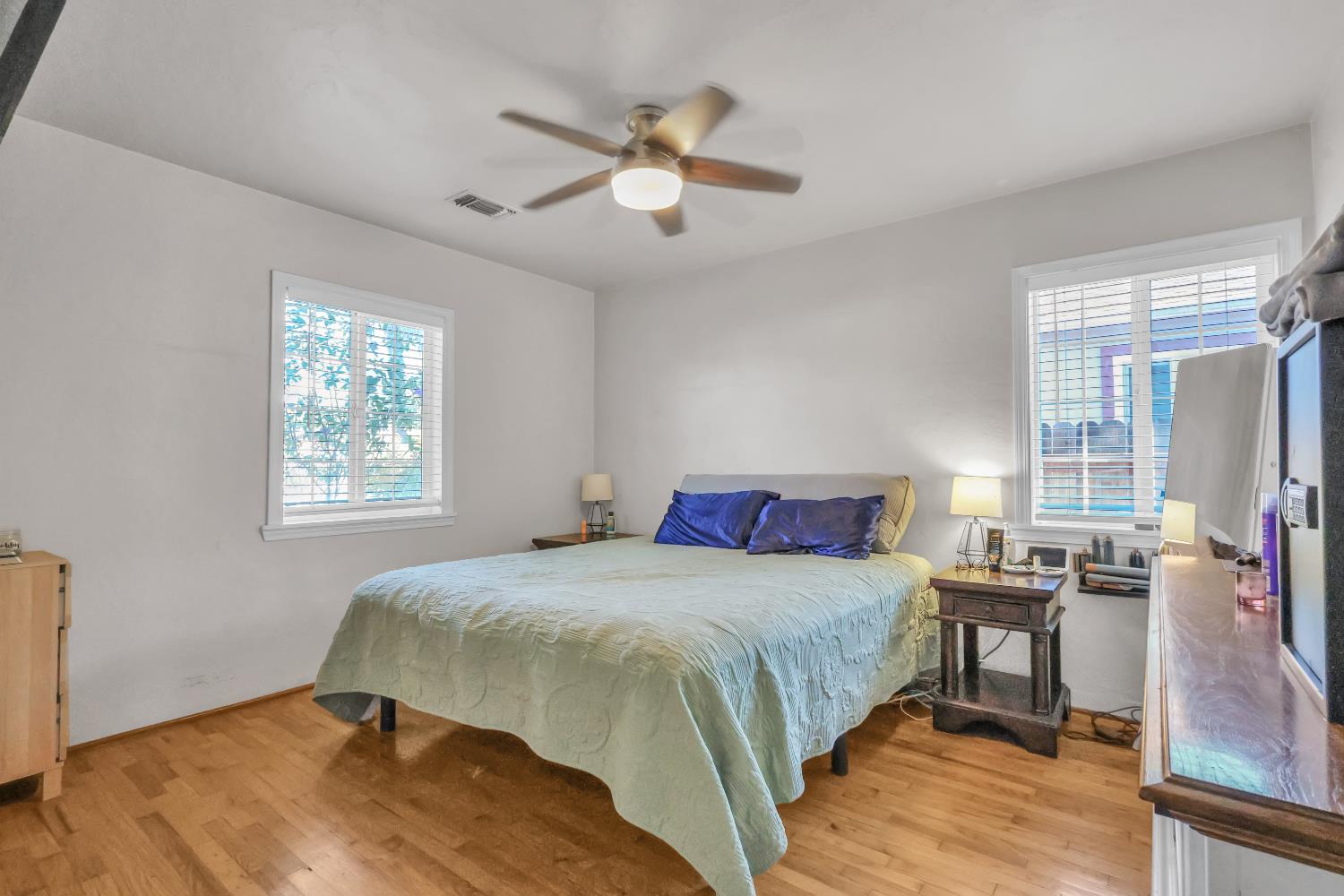 606 West Turner Road Lodi, CA 95240 - Photo 20 of 41 a bedroom with a bed and a window