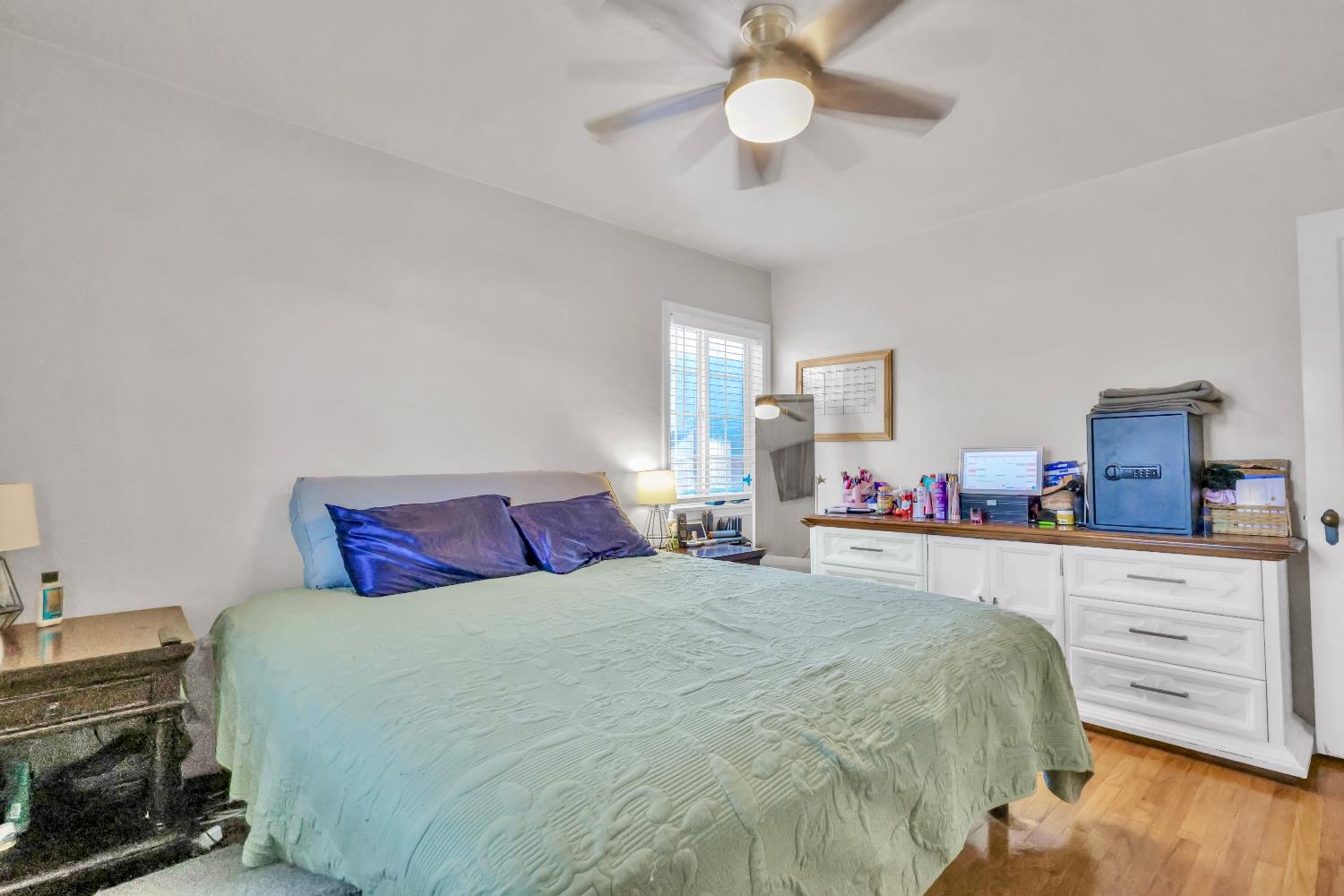 606 West Turner Road Lodi, CA 95240 - Photo 21 of 41 a bedroom with a bed and dresser