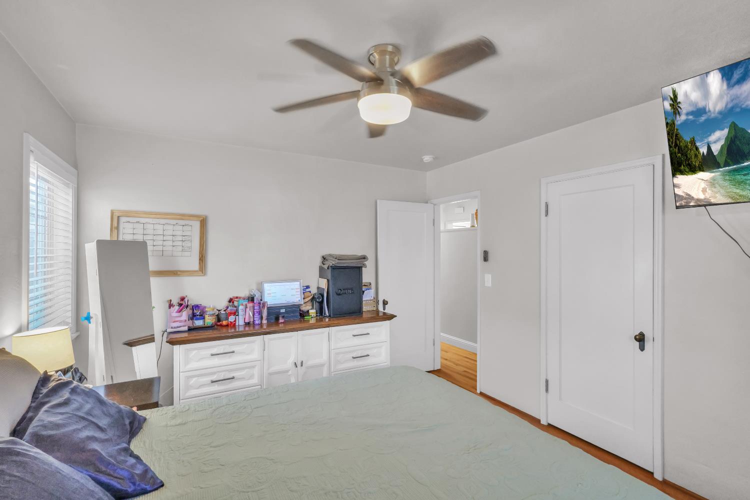 606 West Turner Road Lodi, CA 95240 - Photo 23 of 41 a bedroom with a bed and a flat tv screen