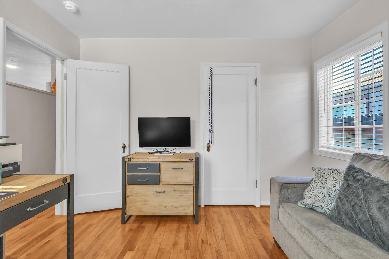 606 West Turner Road Lodi, CA 95240 - Photo 28 of 41 a living room with furniture and a flat screen tv