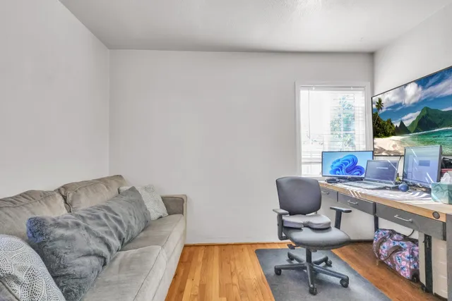 a view of a patio with a yard