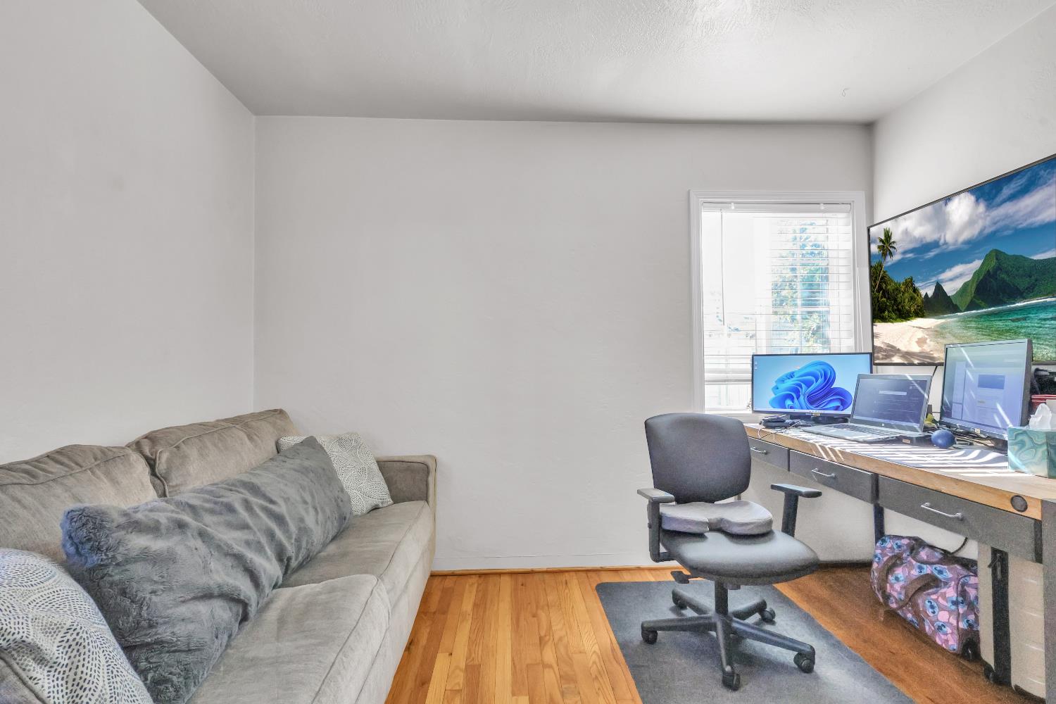 606 West Turner Road Lodi, CA 95240 - Photo 29 of 41 a living room with furniture and a flat screen tv