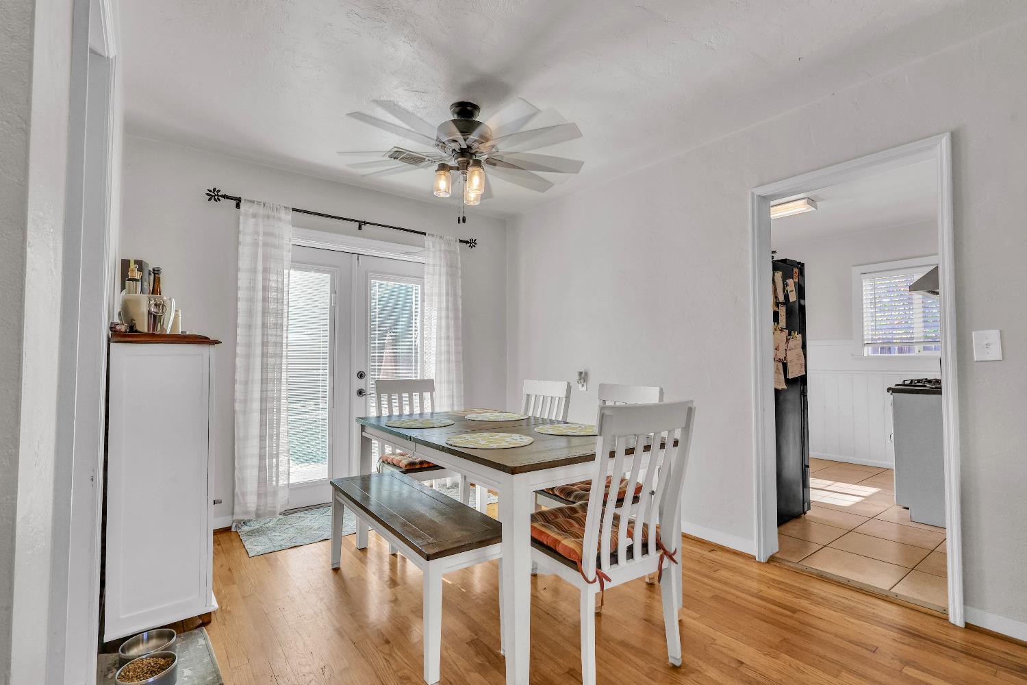 606 West Turner Road Lodi, CA 95240 - Photo 8 of 41 a view of a dining room with furniture and wooden floor