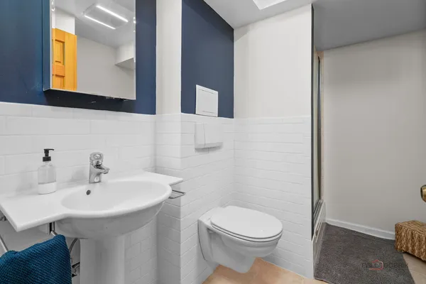 a bathroom with a sink and a toilet