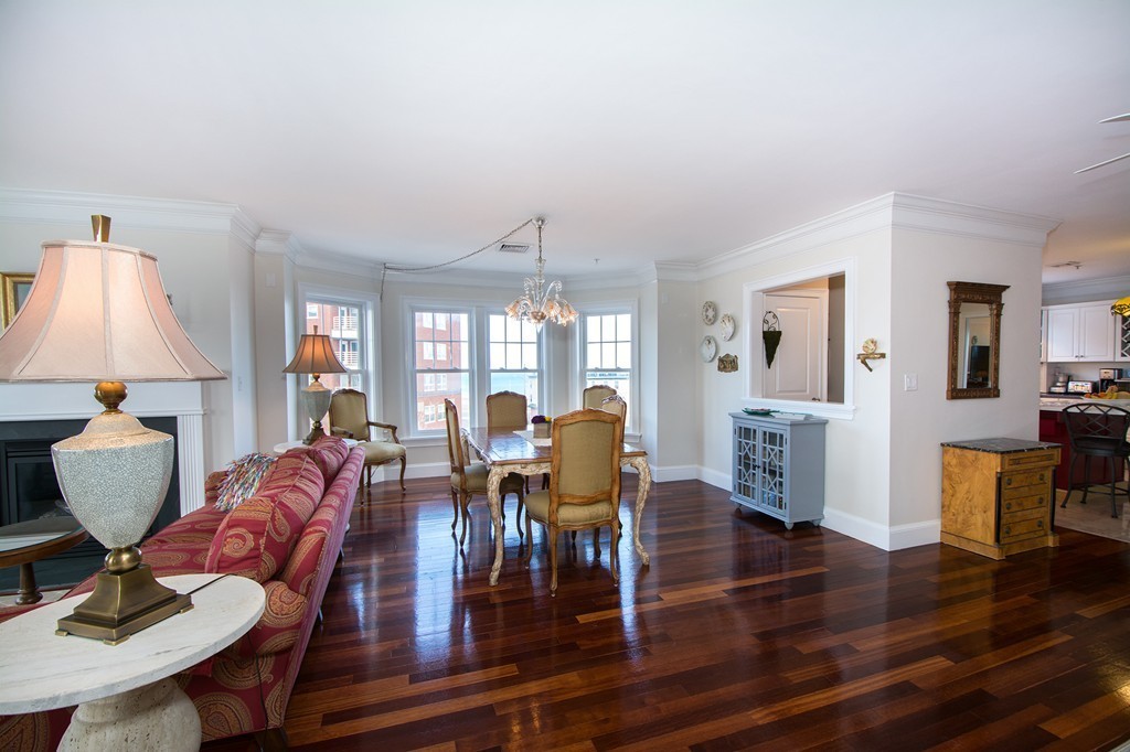 15 Park Avenue, Unit 401 Hull, MA 02045 - Photo 4 of 24 a living room with furniture and a table