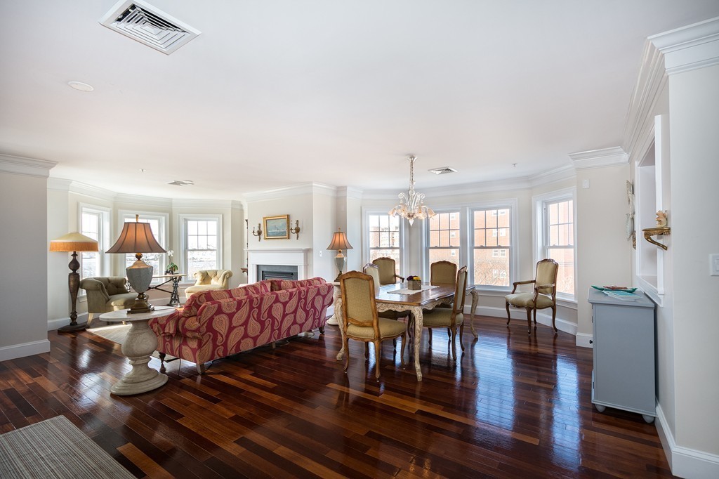 15 Park Avenue, Unit 401 Hull, MA 02045 - Photo 5 of 24 a living room with furniture large window and wooden floor